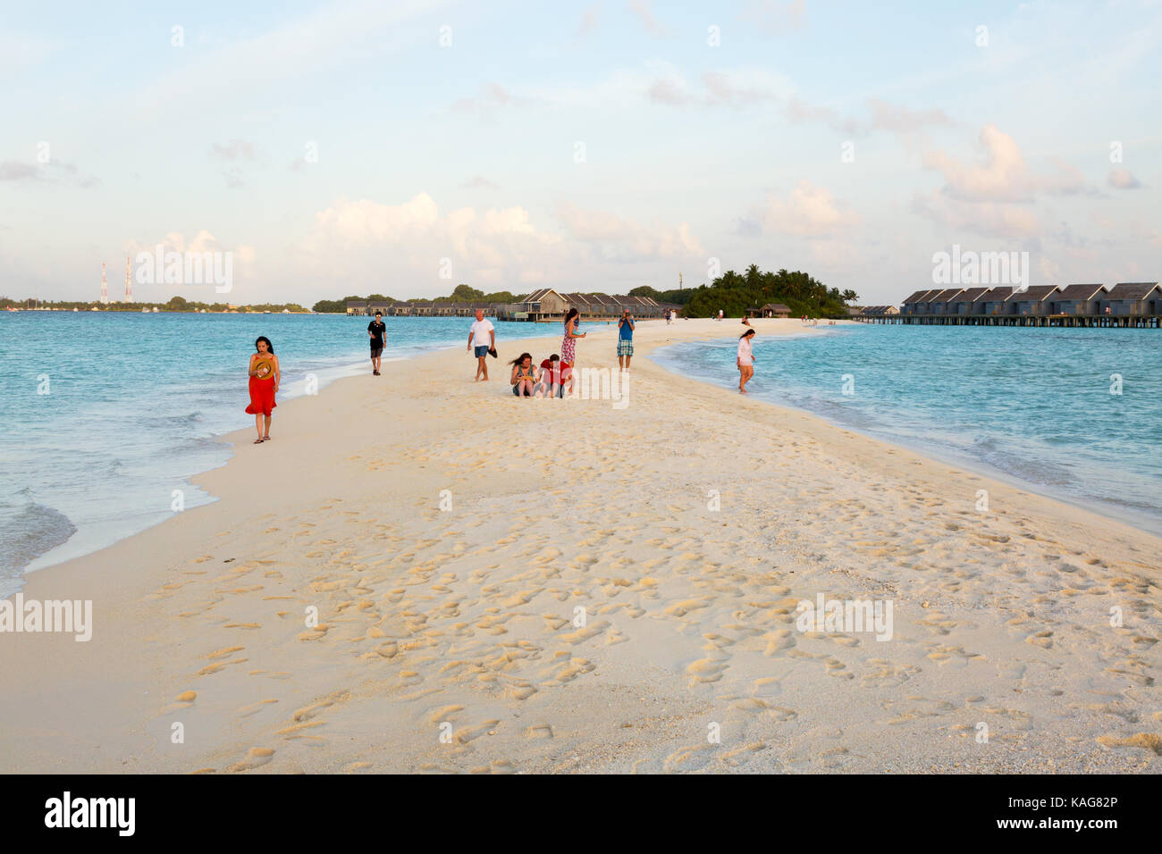 Maldives Beach - tourists on the sandspit, Kuramathi island resort, the Maldives, Asia Stock Photo