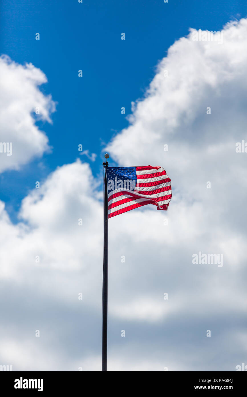 American flag against blue sky Stock Photo - Alamy