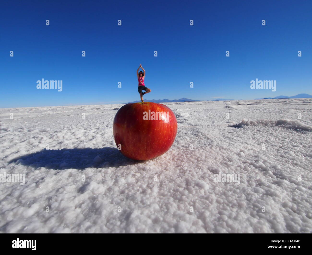 giant apple perspective shot,  Salar de Uyuni, Bolivia Stock Photo