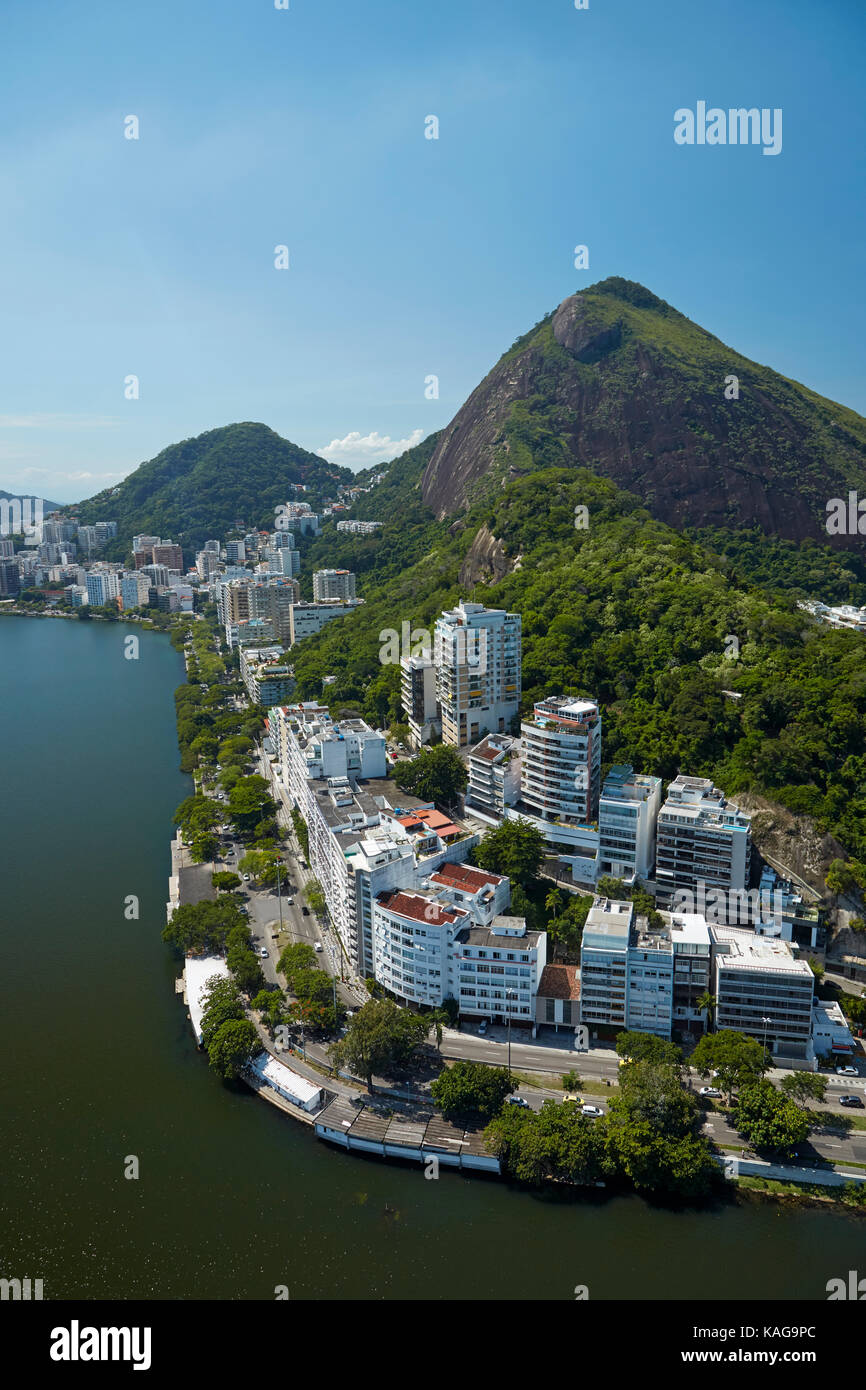 Rodrigo de Freitas Lagoon, and Morro dos Cabritos (rock hill), Rio de Janeiro, Brazil, South America - aerial Stock Photo