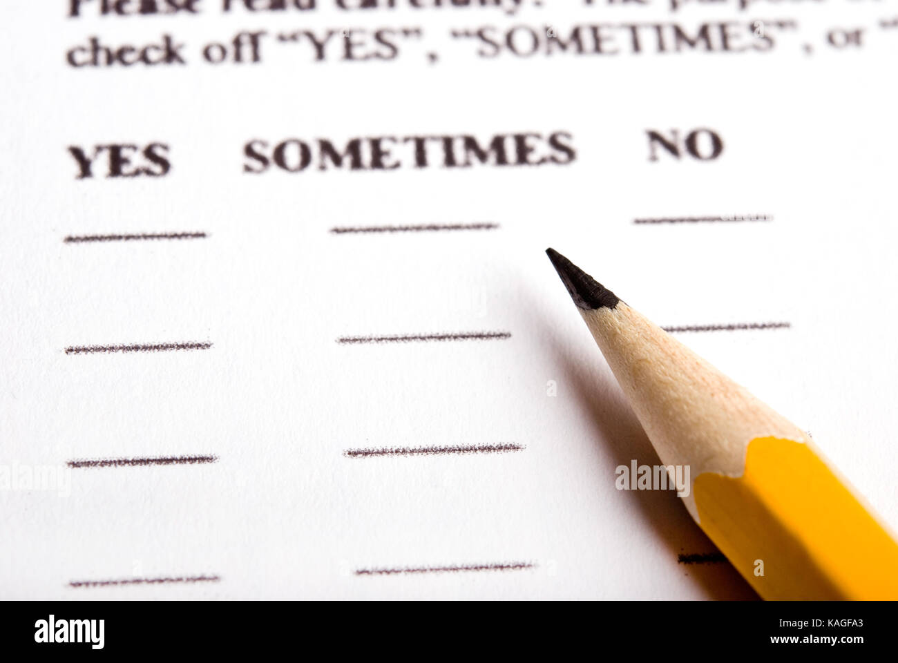 pencil and a test or questionnaire with YES/NO/SOMETIMES answers mode Stock Photo