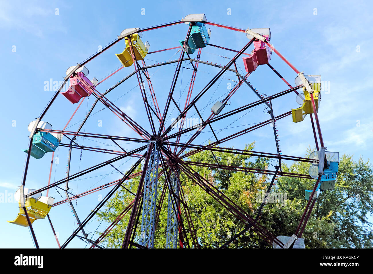 A ferris wheel sits stationary against the autumn sky in Geneva-on-the-Lake, Ohio, out-of-operation until the following summer season. Stock Photo