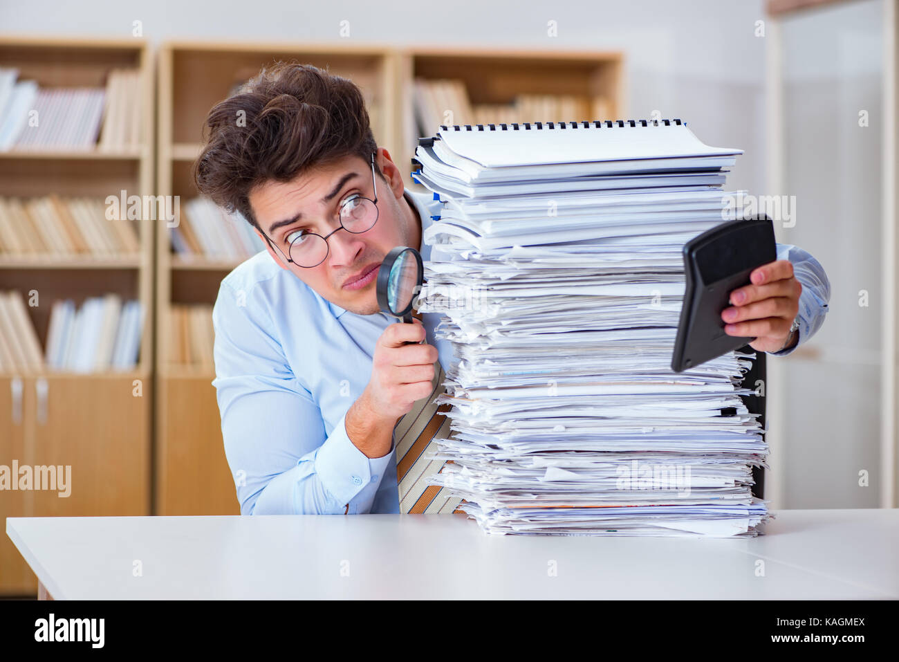 Funny accountant bookkeeper working in the office Stock Photo - Alamy