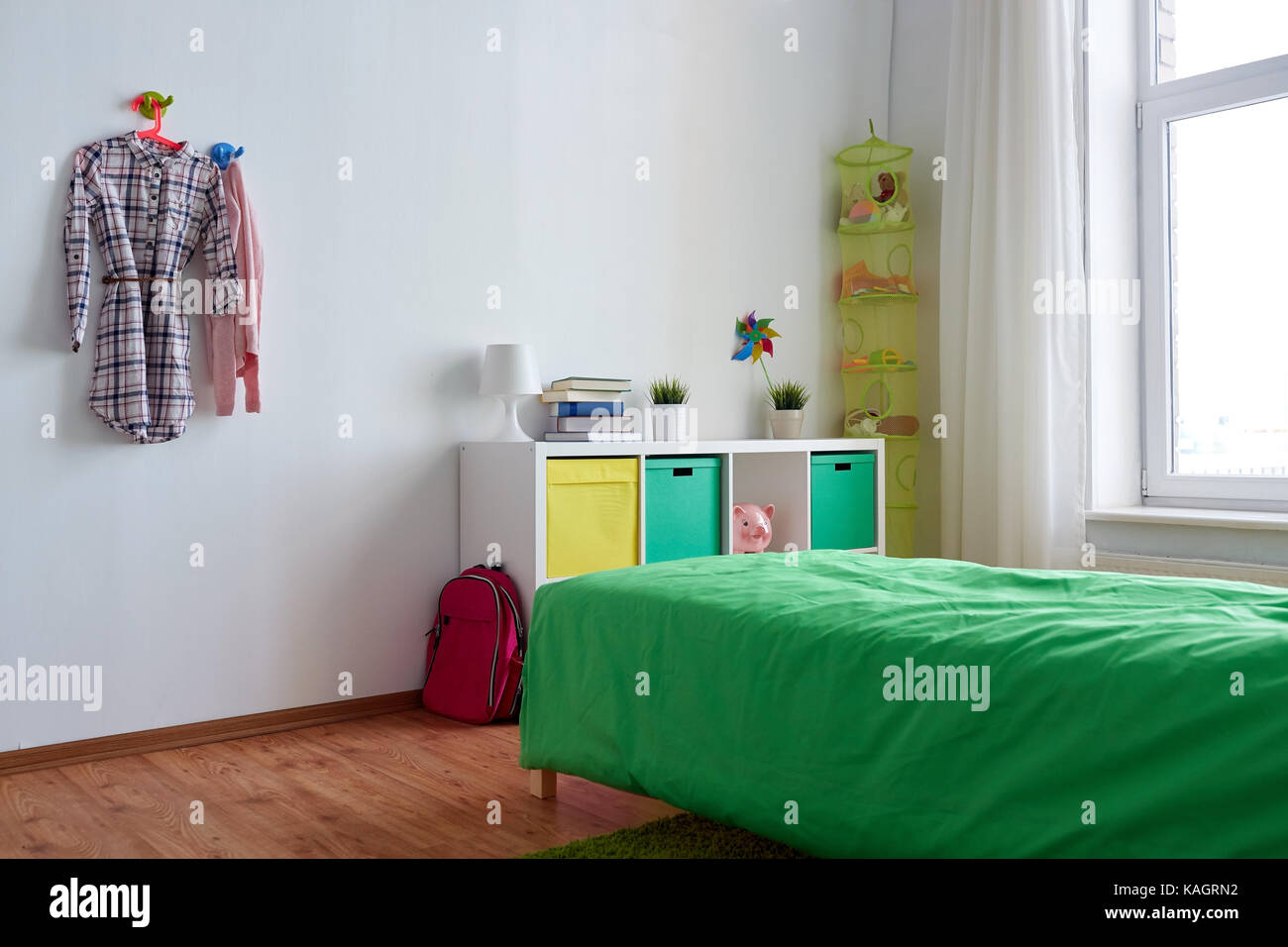 kids room interior with bed, rack and accessories Stock Photo