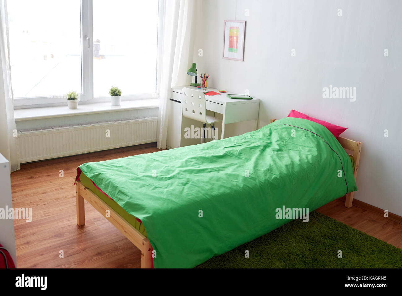 kids room interior with bed, table and accessories Stock Photo Alamy