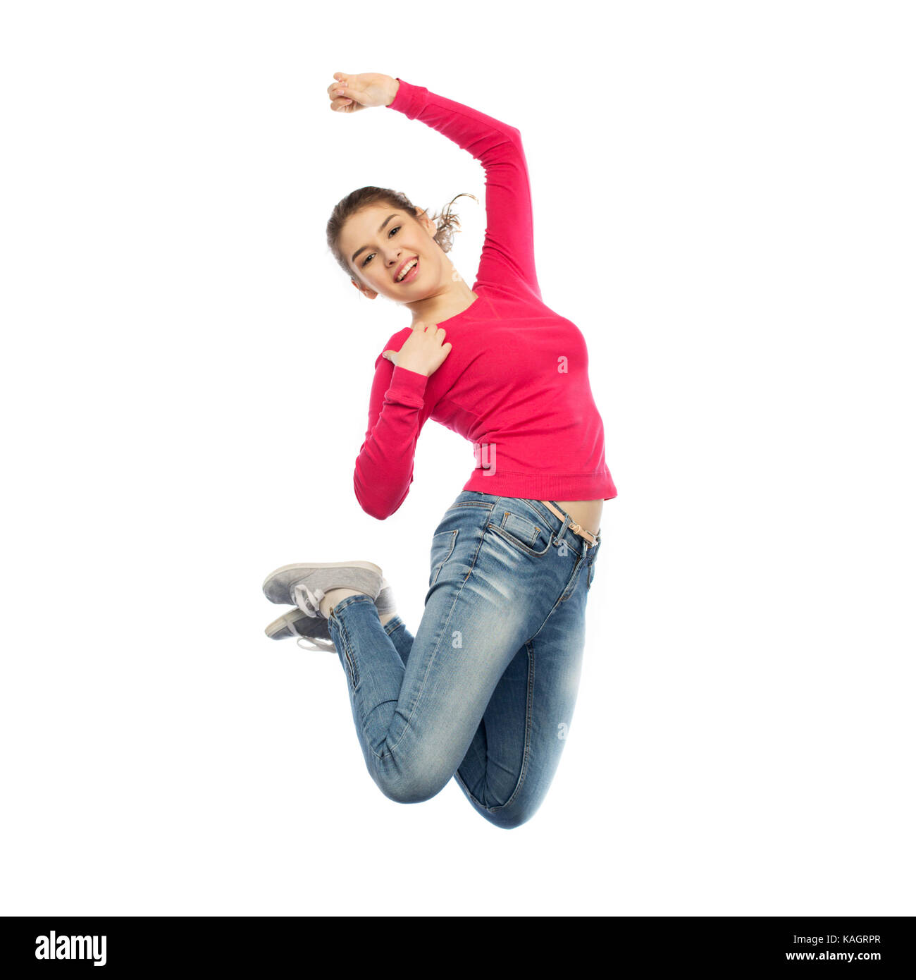 Happy young woman jumping air hi-res stock photography and images - Alamy