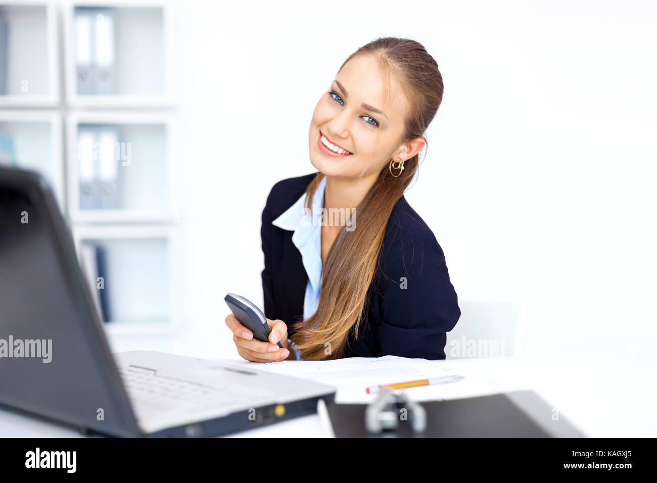 Closeup portrait of cute young business woman in office Stock Photo - Alamy