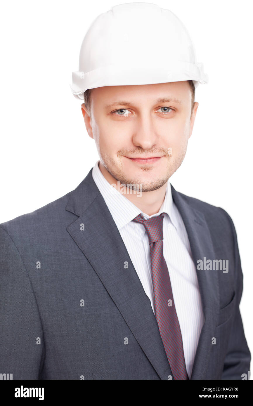 Engineer with white hard hat standing confidently isolated on white