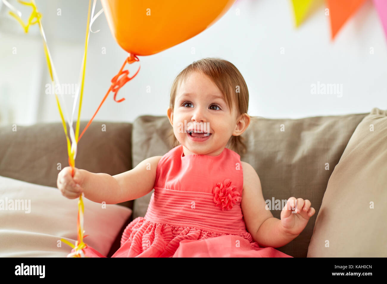 happy baby girl on birthday party at home Stock Photo - Alamy