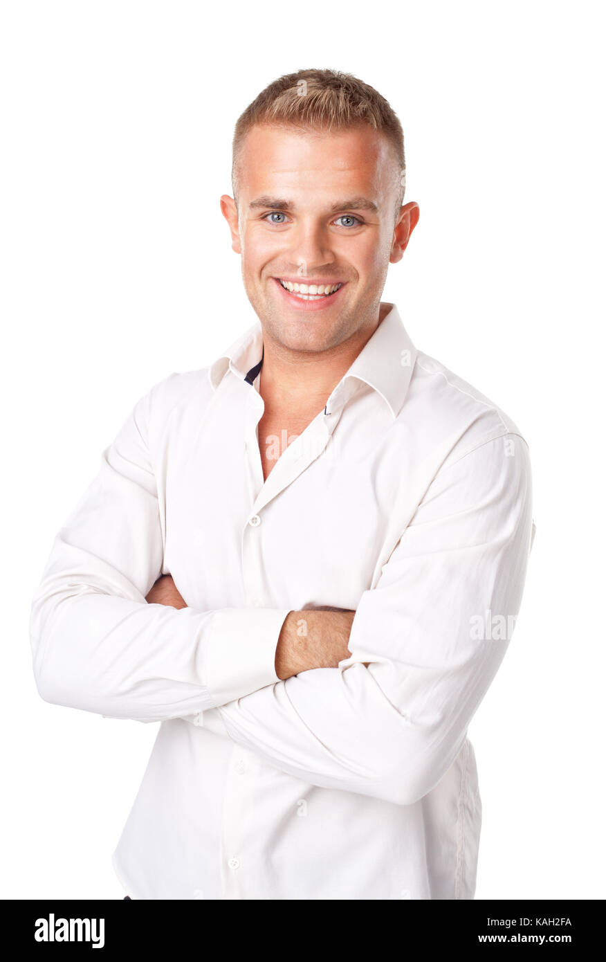 Portrait of happy smiling young man wearing a white shirt isolated on ...