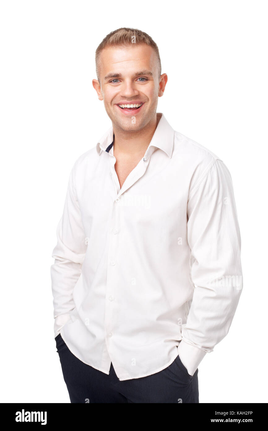 Portrait of happy smiling young man wearing a white shirt isolated on ...