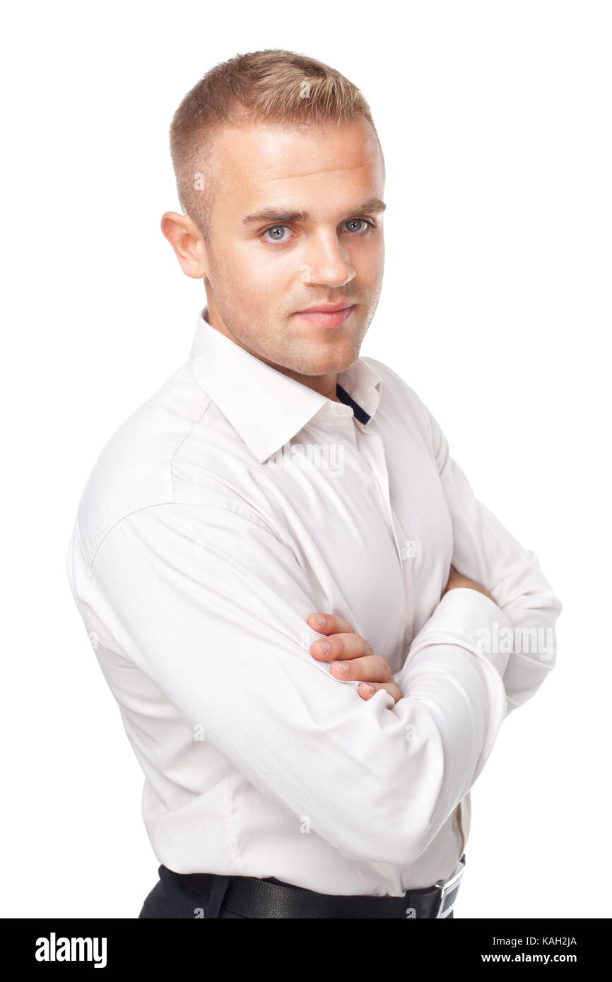 Portrait of happy smiling young man wearing a white shirt isolated on ...