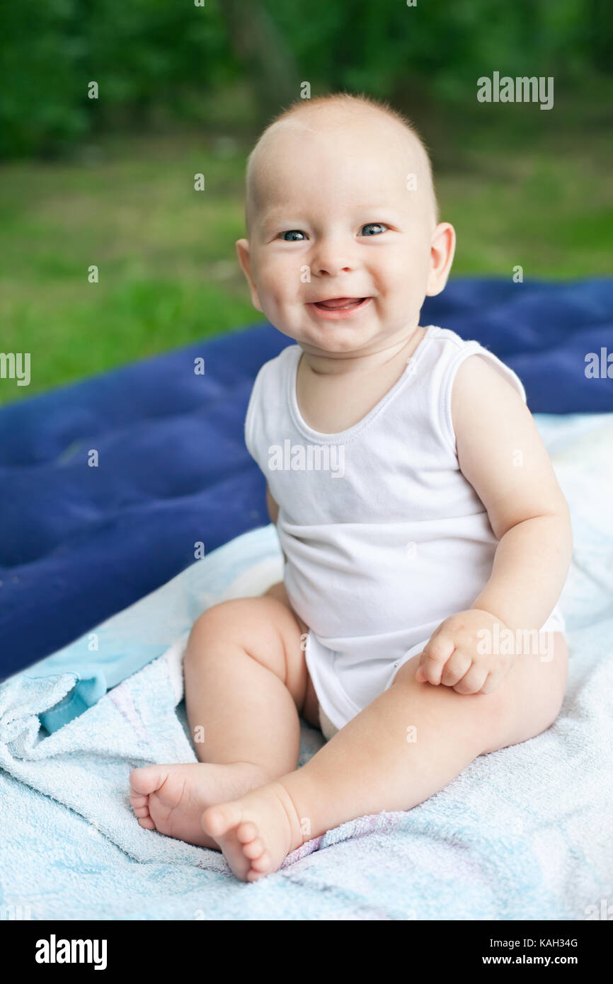 smiling happy baby boy on picnic in summer Stock Photo - Alamy