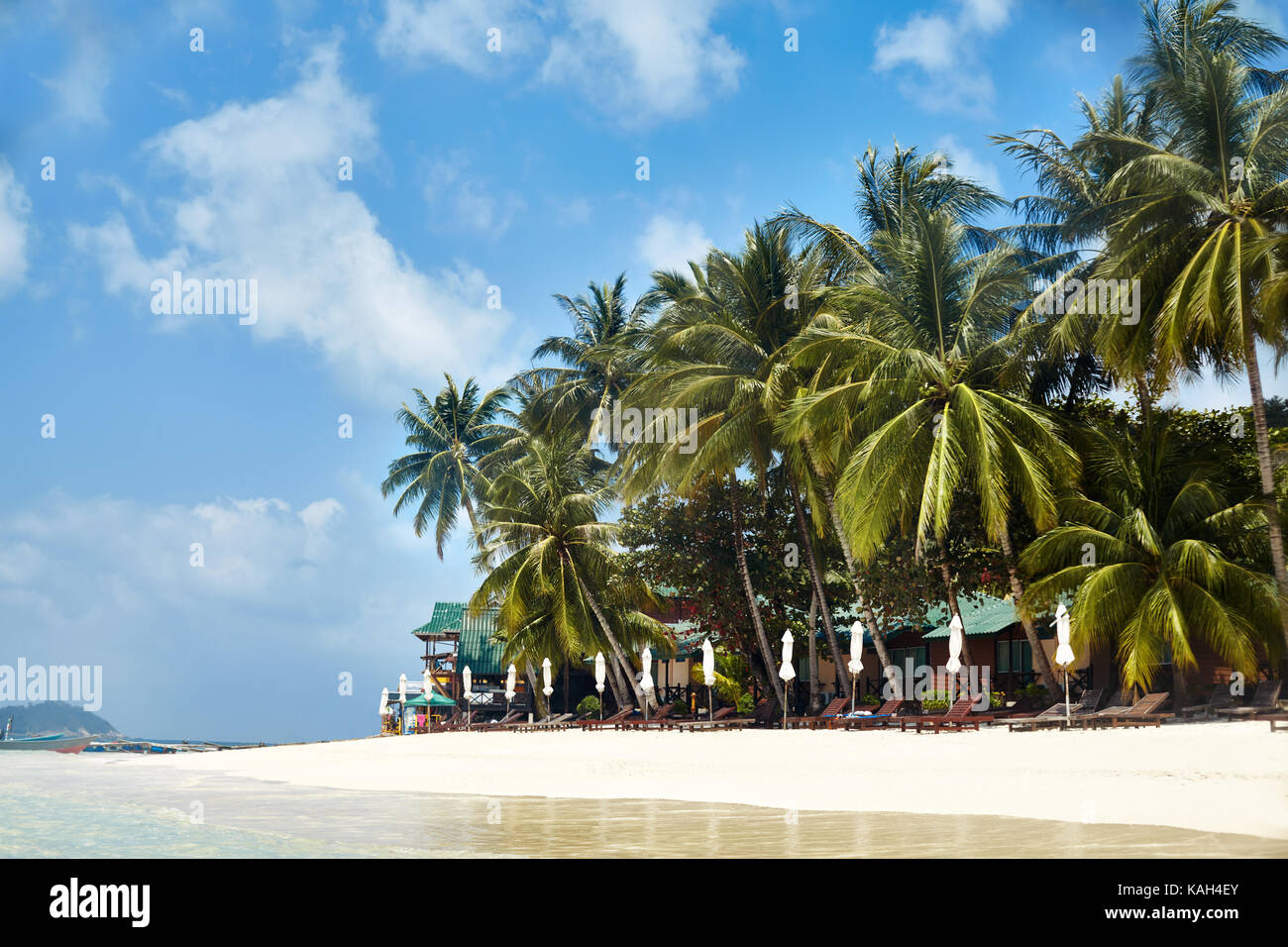 Tropical resort on the beach Stock Photo