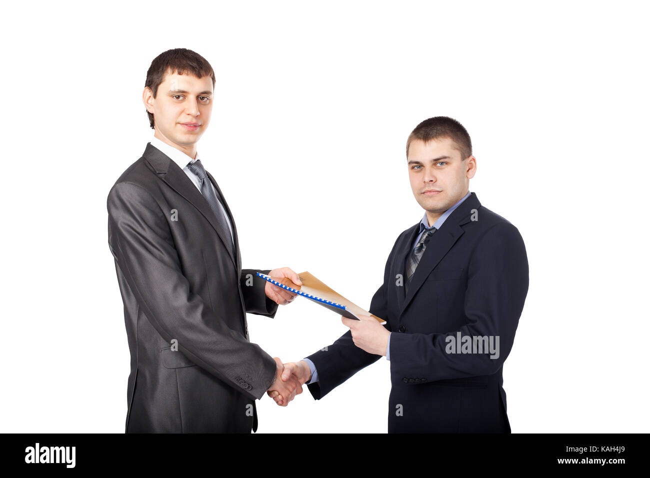 Handshake of business partners, when signing documents isolated on