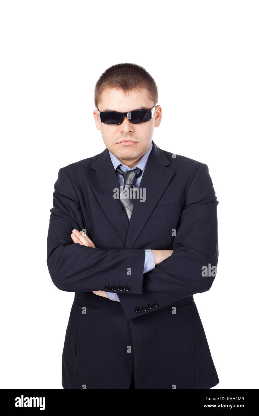 Security guard wearing a suit and sunglasses isolated on white