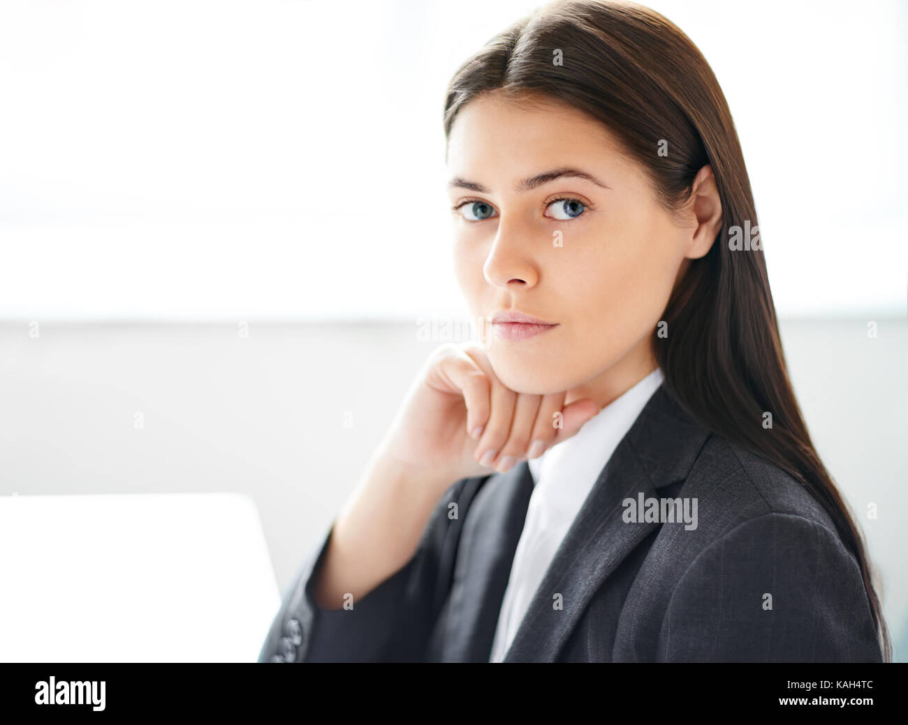 Portrait of young beautiful business woman in the office Stock Photo ...