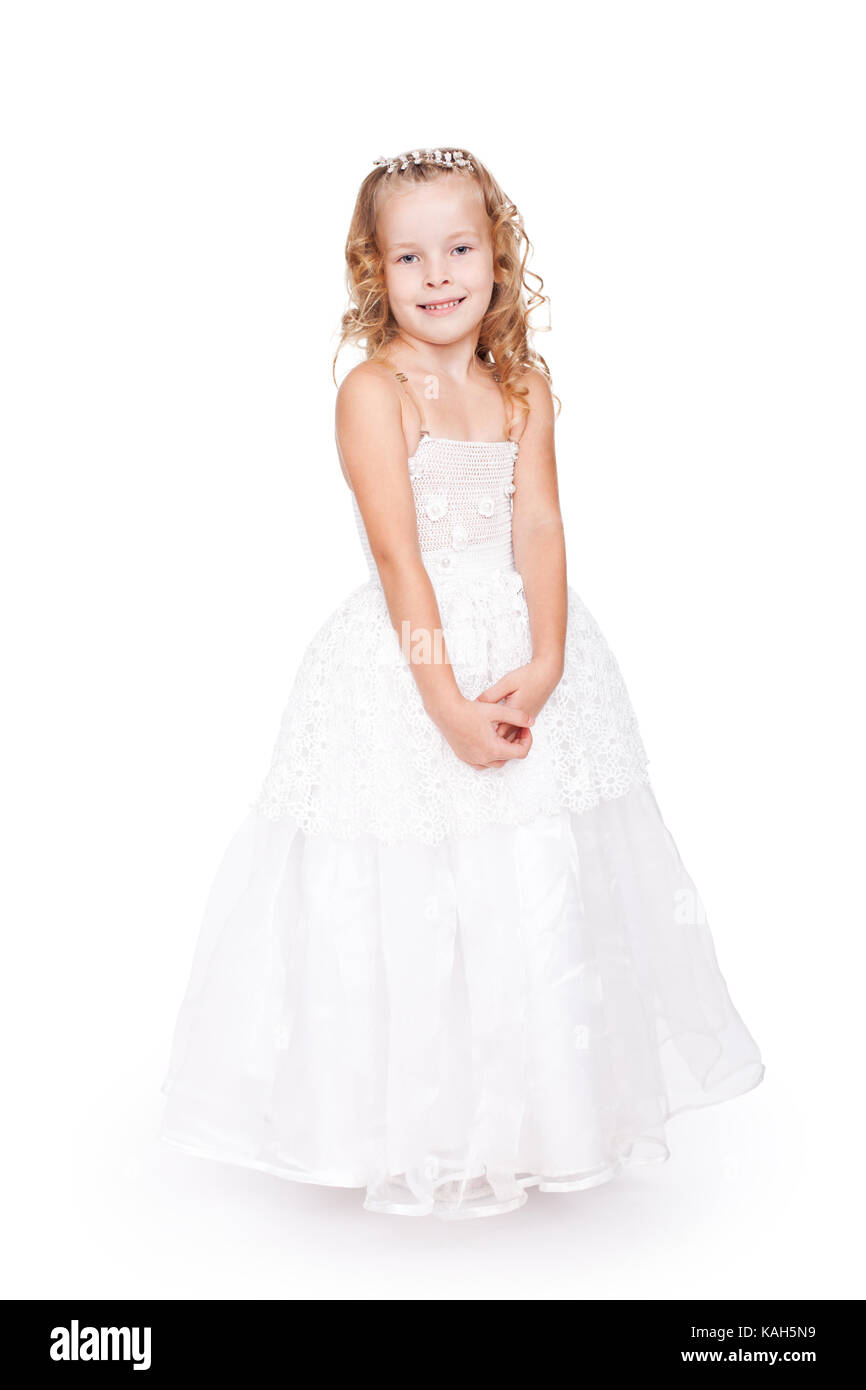 pretty little girl in beautiful white dress isolated on white ...