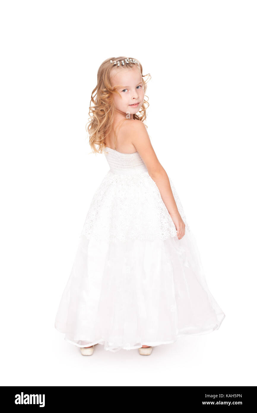 pretty little girl in beautiful white dress isolated on white ...