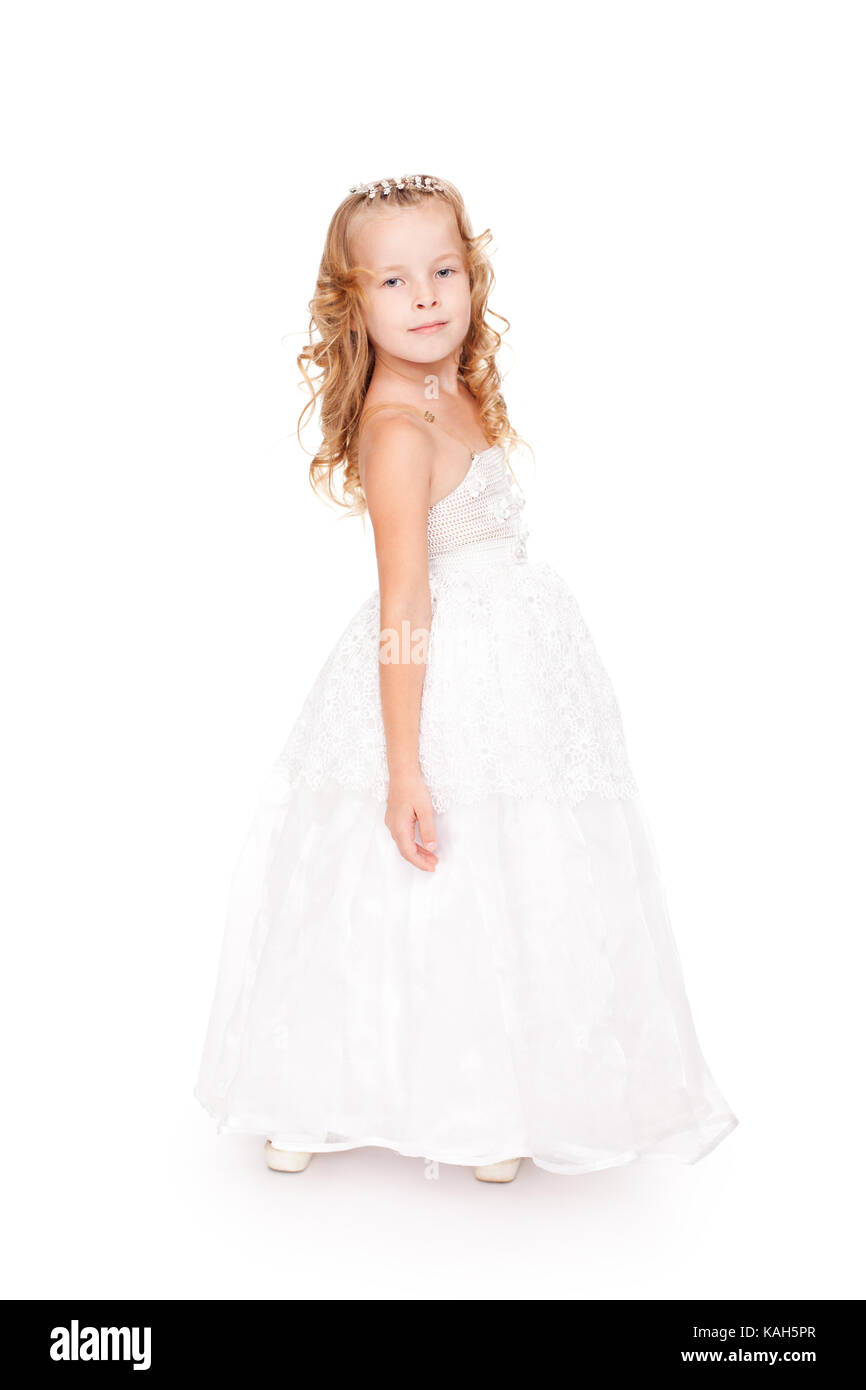 pretty little girl in beautiful white dress isolated on white ...