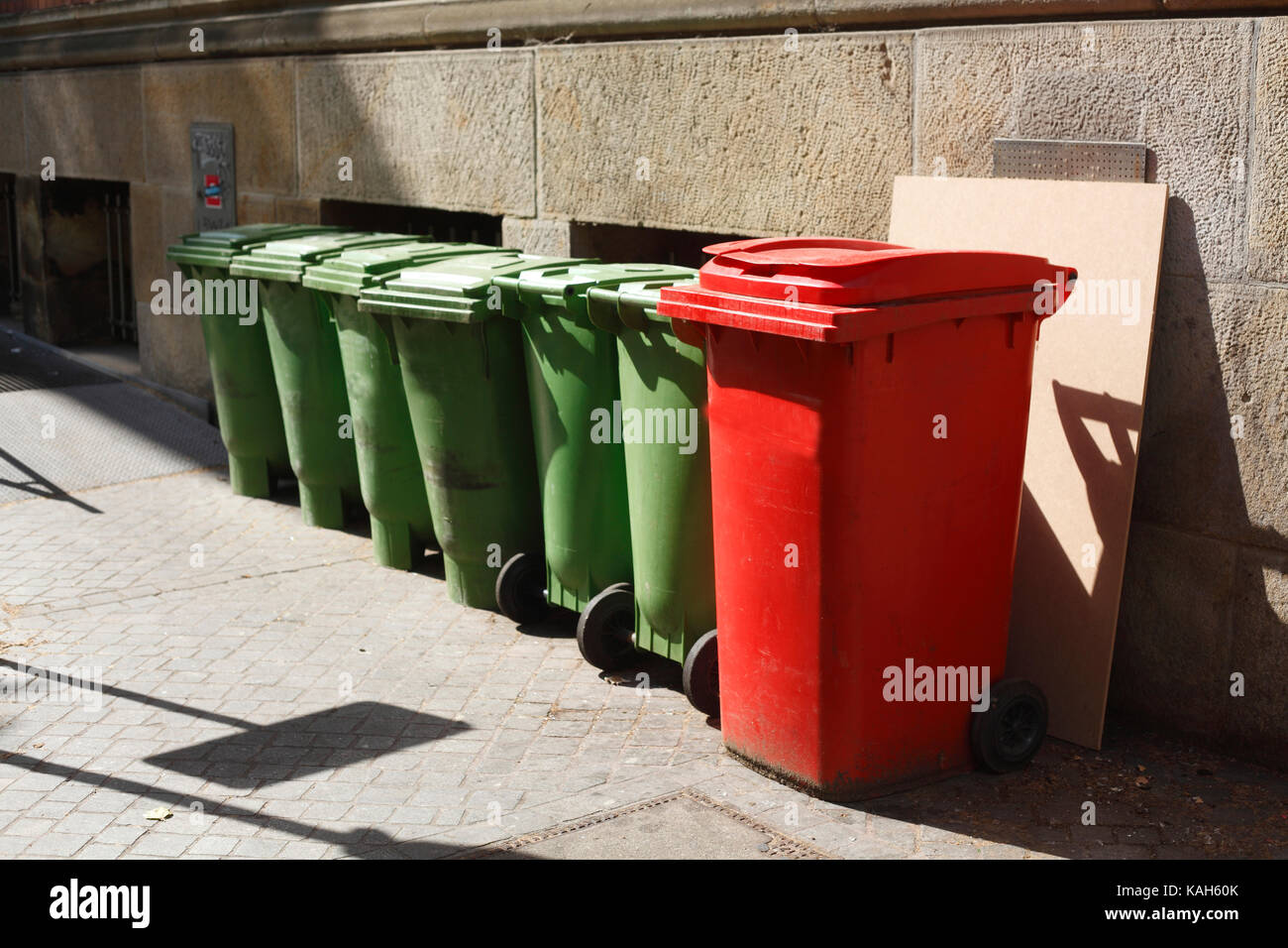 green and red recycling bins Stock Photo Alamy