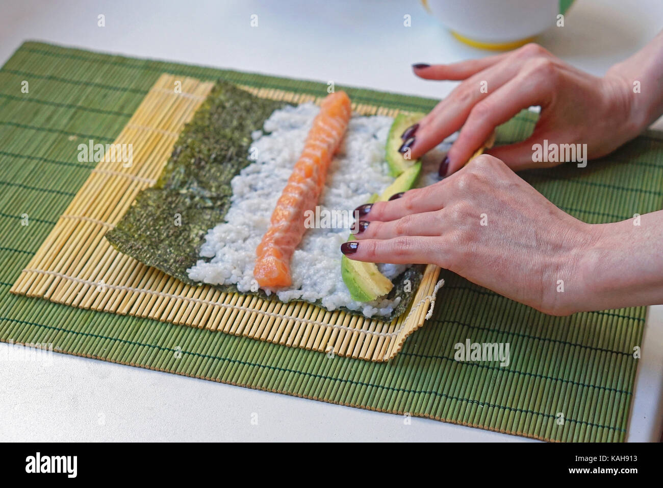 How roll sushi with bamboo mat (California Roll) 