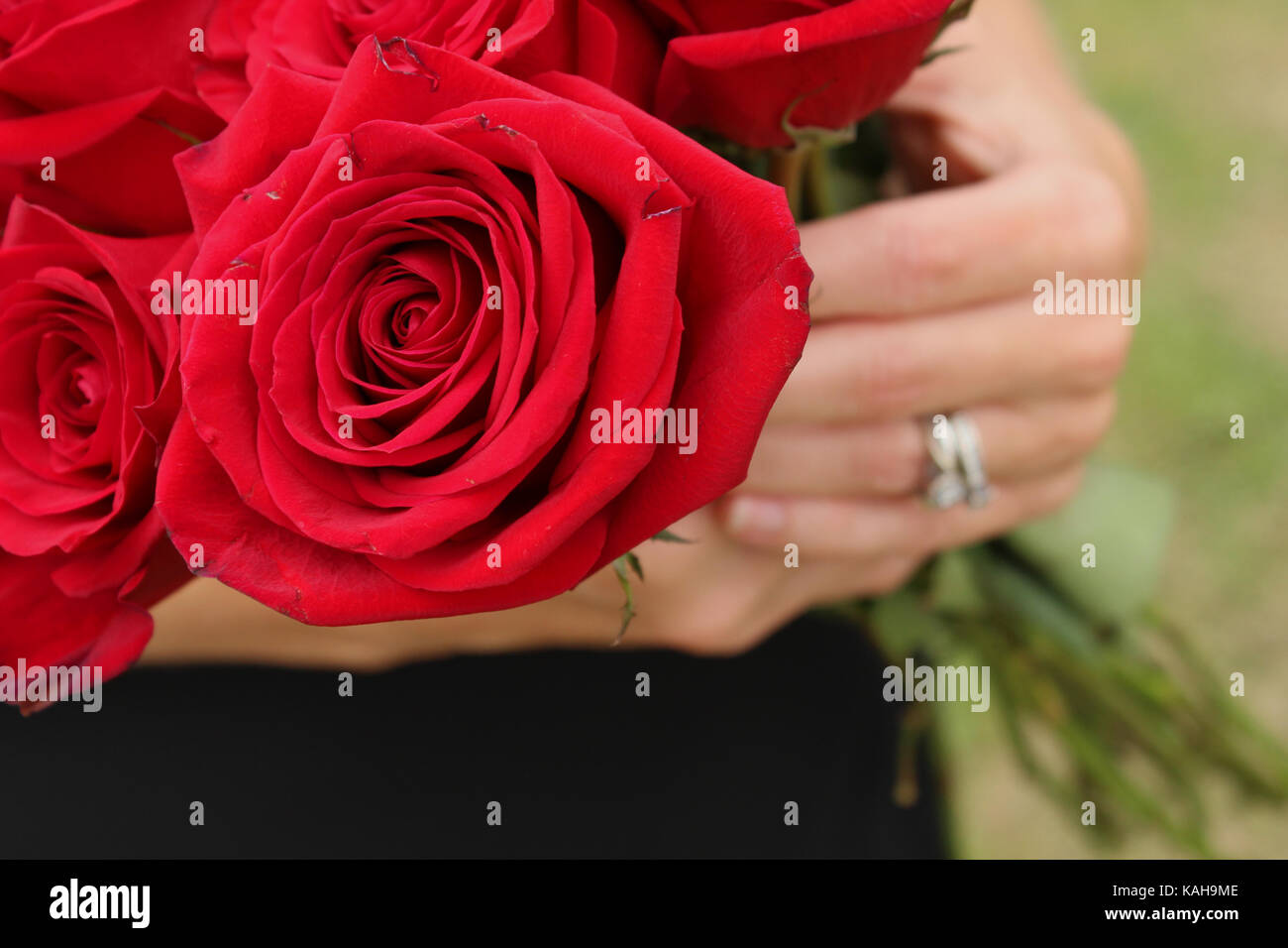 Widow in veil with flowers Stock Photo Alamy