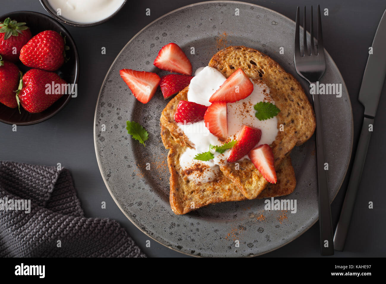 french toasts with yogurt and strawberries for breakfast Stock Photo