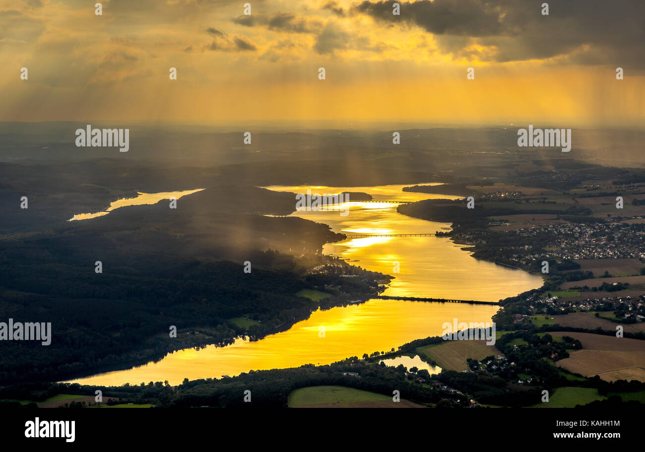 Evening sun reflected in the Möhnesee, reservoir, Sauerland, North Rhine-Westphalia, Germany Stock Photo