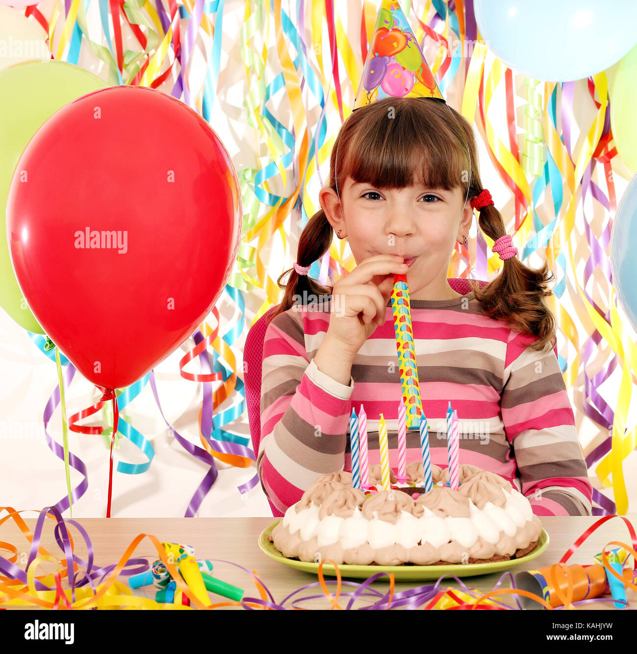 happy little girl on birthday party Stock Photo - Alamy