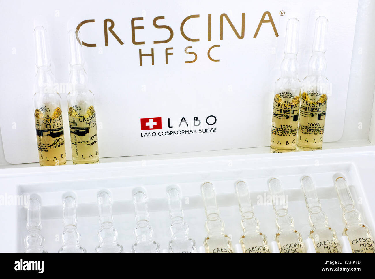 Paphos, Cyprus - November 13, 2015  Ampoules of Crescina HFSC Re-Growth in Crescina treatment box. Stock Photo