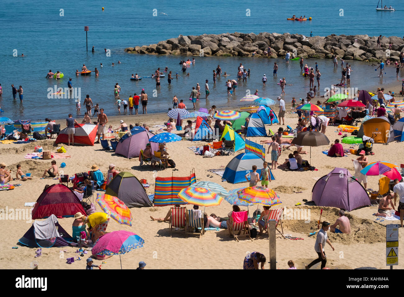 Crowded beach at in summer at Lyme Regis, Dorset, UK Stock Photo - Alamy