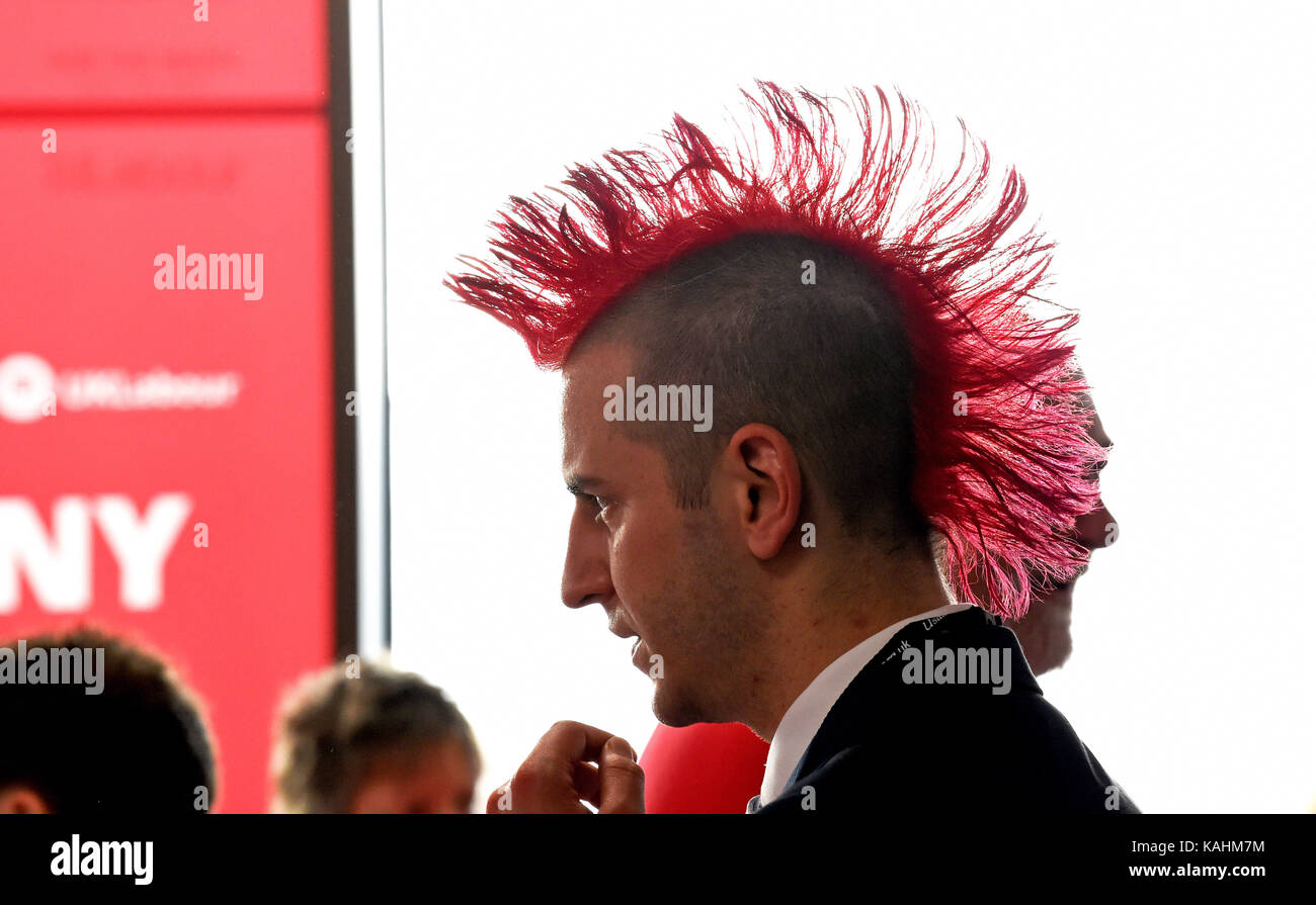 Brighton, UK. 26th Sep, 2017. Red mohican hair style at the Labour Party Conference in Brighton today Credit: Simon Dack/Alamy Live News Stock Photo