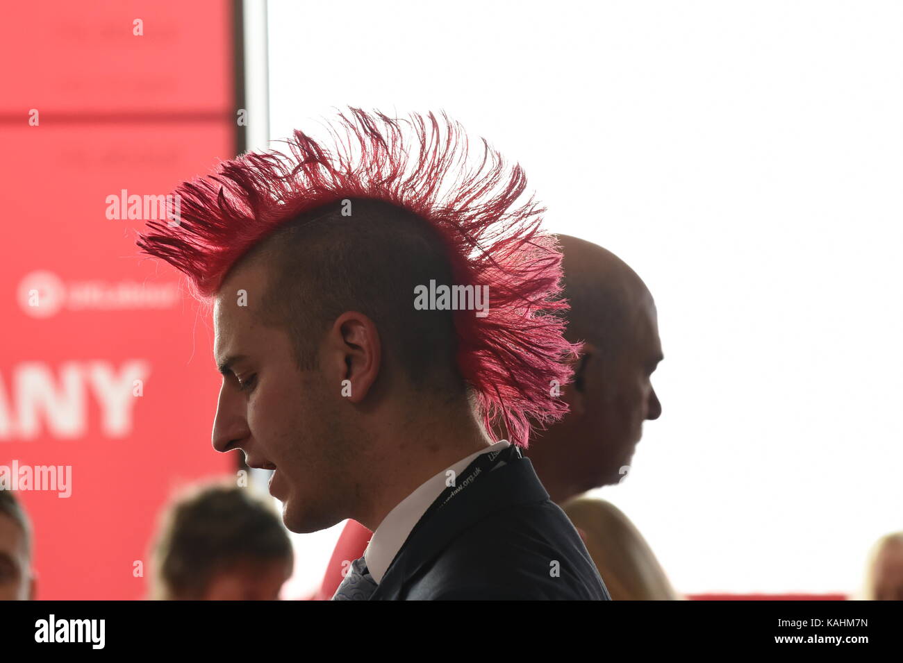 Brighton, UK. 26th Sep, 2017. Red mohican hair style at the Labour Party  Conference in Brighton today Credit: Simon Dack/Alamy Live News Stock Photo  - Alamy