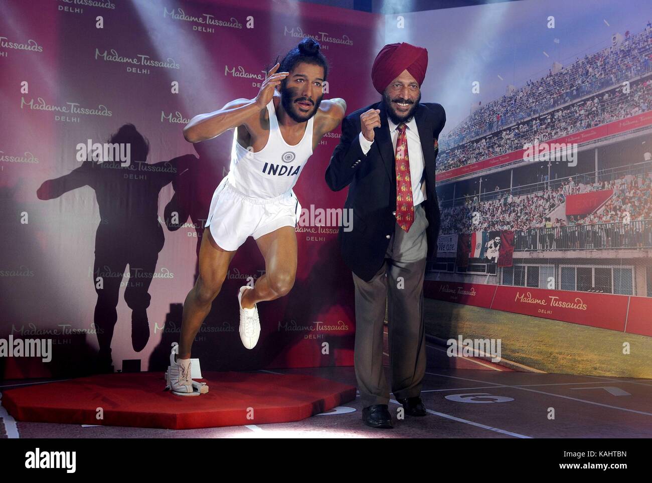CHANDIGARH, INDIA - SEPTEMBER 26: Legendary athlete Milkha Singh unveiling his wax statue for Madame Tussauds museum on September 26, 2017 in Chandigarh, India. Milkha Singh was the country's first athlete to win gold in the Commonwealth Games (1958 Cardiff) and missed a medal at 1960 Rome Olympic medal by a whisker, finishing fourth in the 400m final. The wax statue of Milkha Singh will share space with Mahatma Gandhi, Prime Minister Narendra Modi, Kapil Dev and Amitabh Bachchan and international celebrities such as Michael Jackson at the Madame Tussauds Delhi museum which will open on Decemb Stock Photo