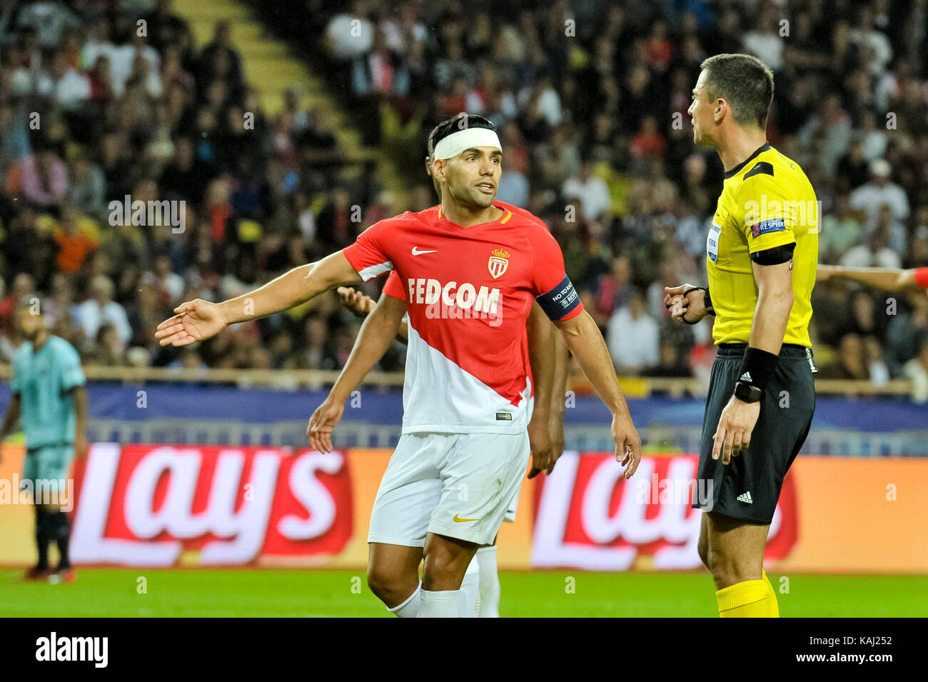 Monaco, France. 26th Sep, 2017. Radamel Falcao (L) (AS Monaco) Slavko Vincic (R) (referre) during the Champions League Group Match between AS Monaco and FC Porto in the Stade Louis II in Monaco, 26 September 2017 Credit: Norbert Scanella/Alamy Live News Stock Photo