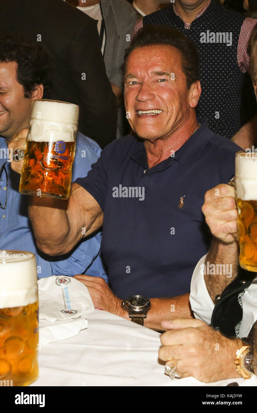 Arnold Schwarzenegger actors celebrates with Mass beer in the Stock