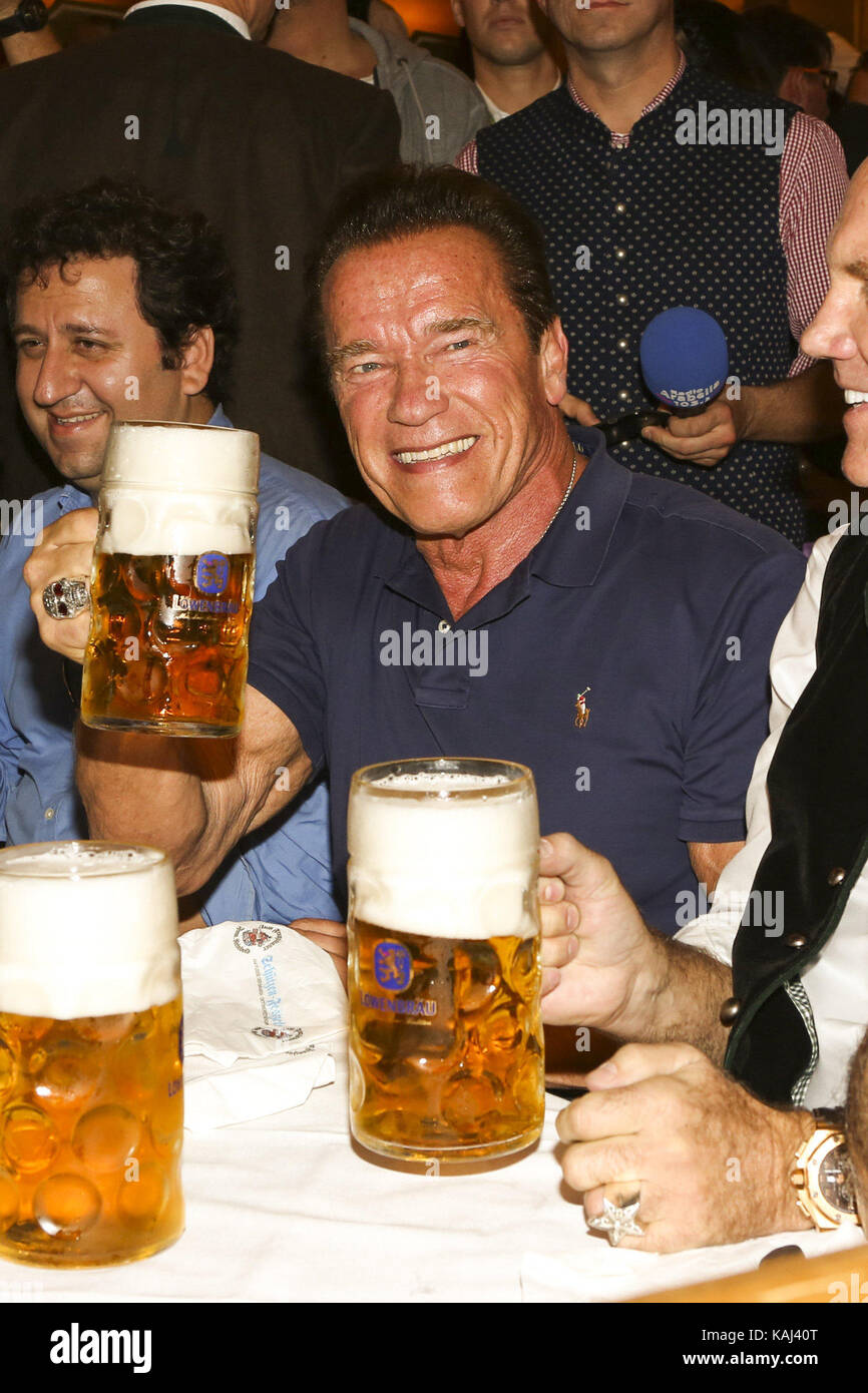 Arnold Schwarzenegger actors celebrates with Mass beer in the