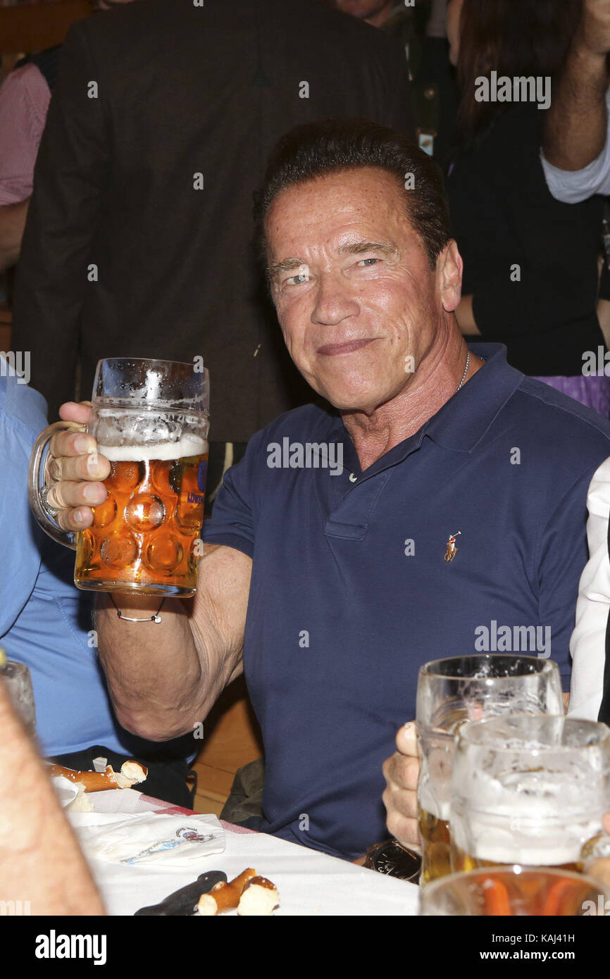 Arnold Schwarzenegger actors celebrates with Mass beer in the