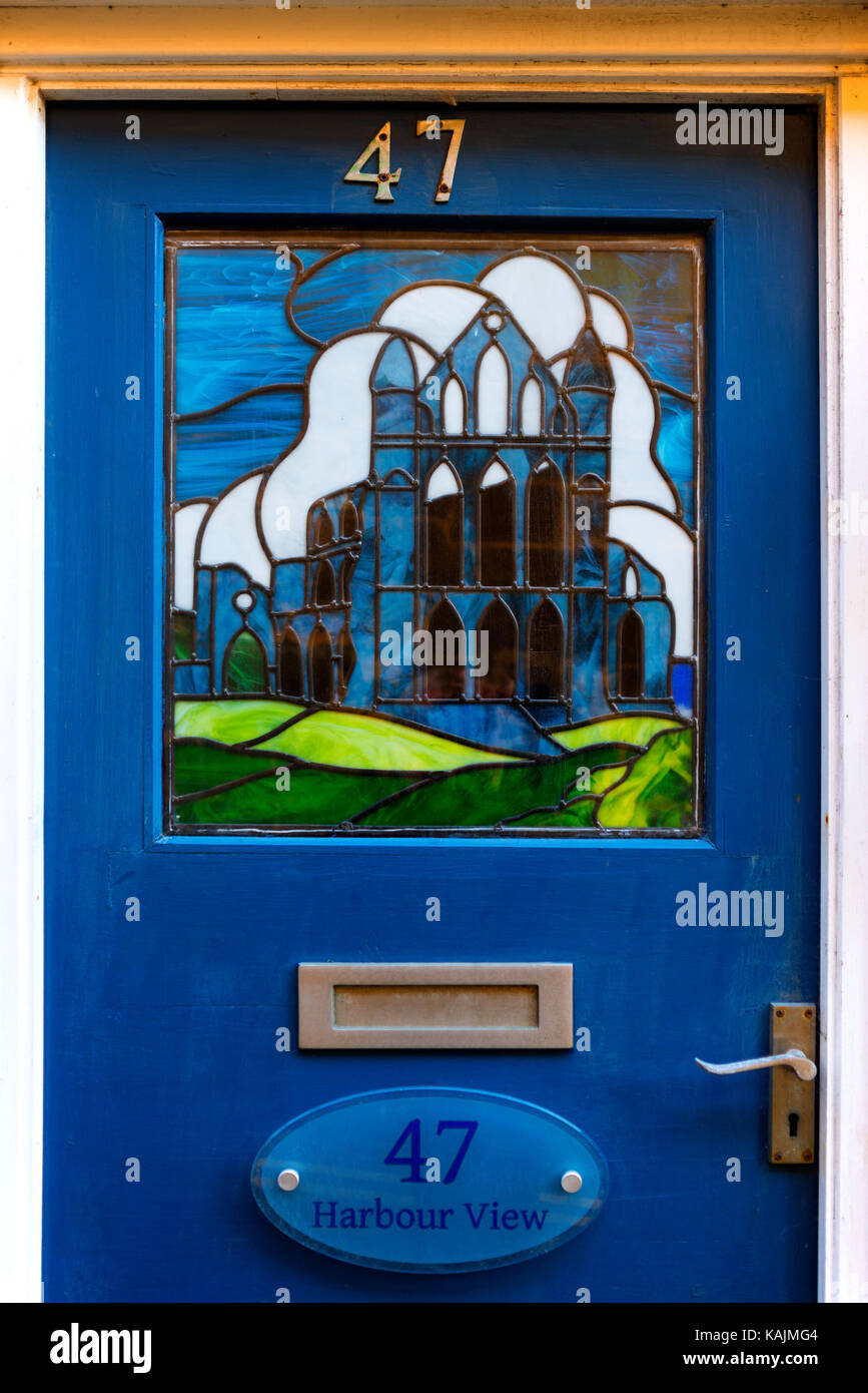 Whitby Abbey Stained Glass Feature, Cottage Door Stock Photo Alamy