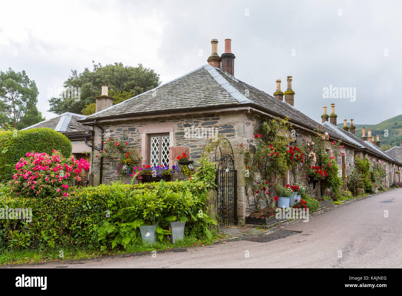 Typical houses in Luss with plenty of flowers, on the west bank of Loch