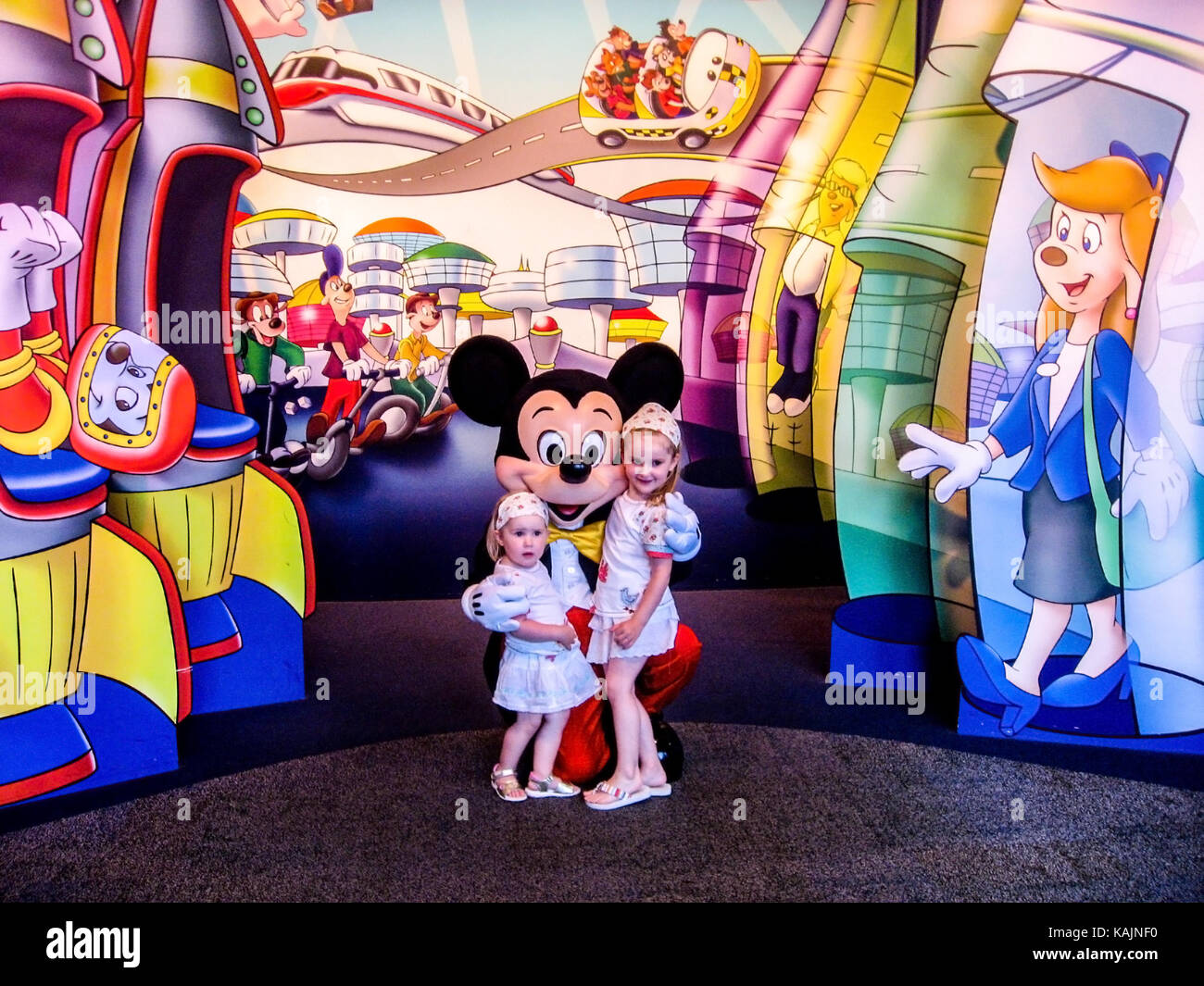 Children meeting Mickey Mouse in Disney World Florida USA Stock Photo