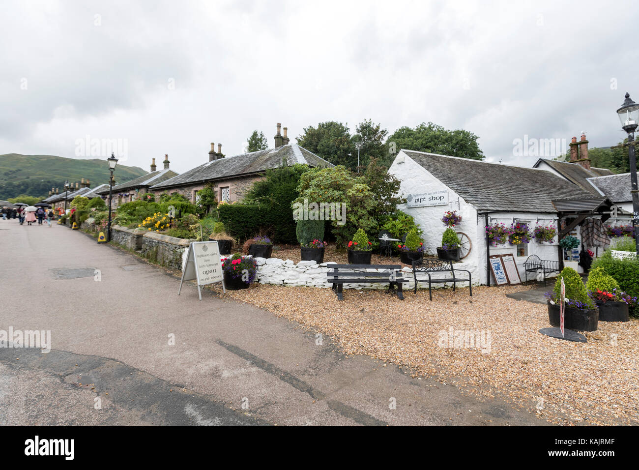 Typical houses in Luss with plenty of flowers, on the west bank of Loch