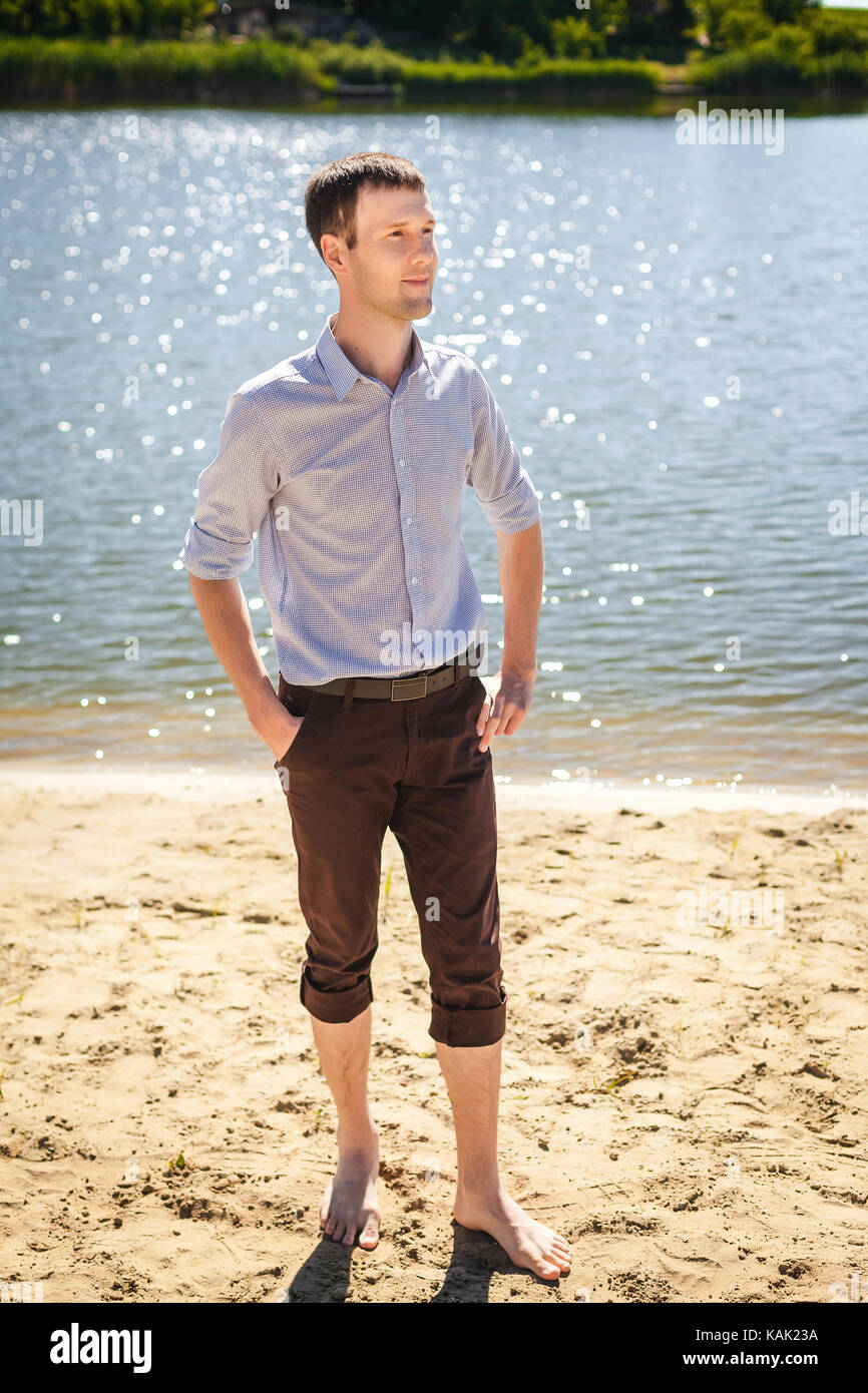 Beautiful young man walking on hi-res stock photography and images - Alamy