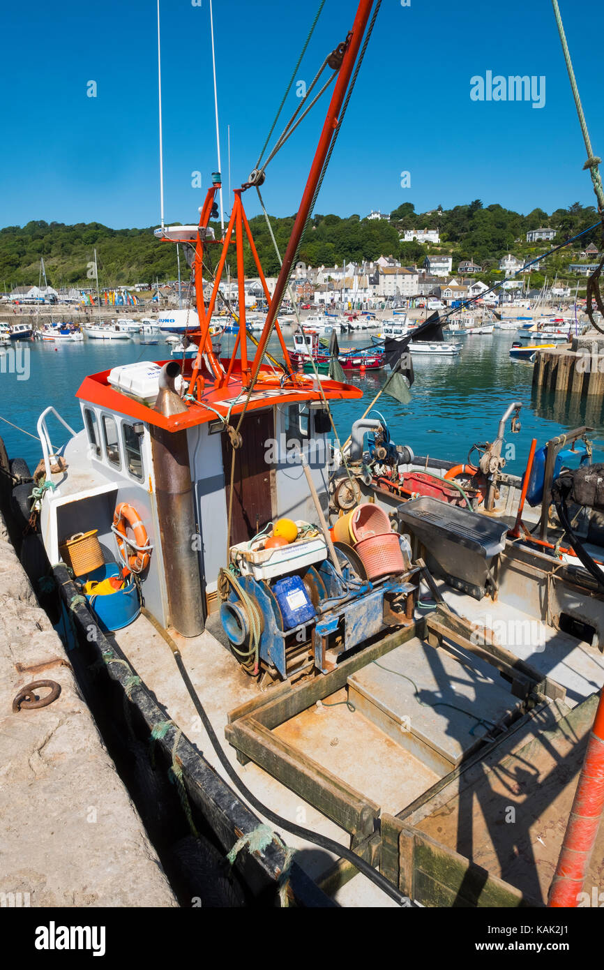 Fishing boat in the harbour at Lyme Regis, Dorset, UK Stock Photo - Alamy