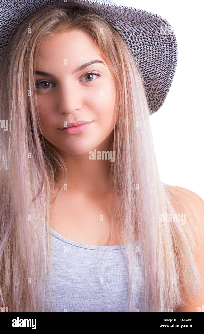 Portrait of a teenager gril in hat, close up, cropped images, isolated on white background Stock Photo