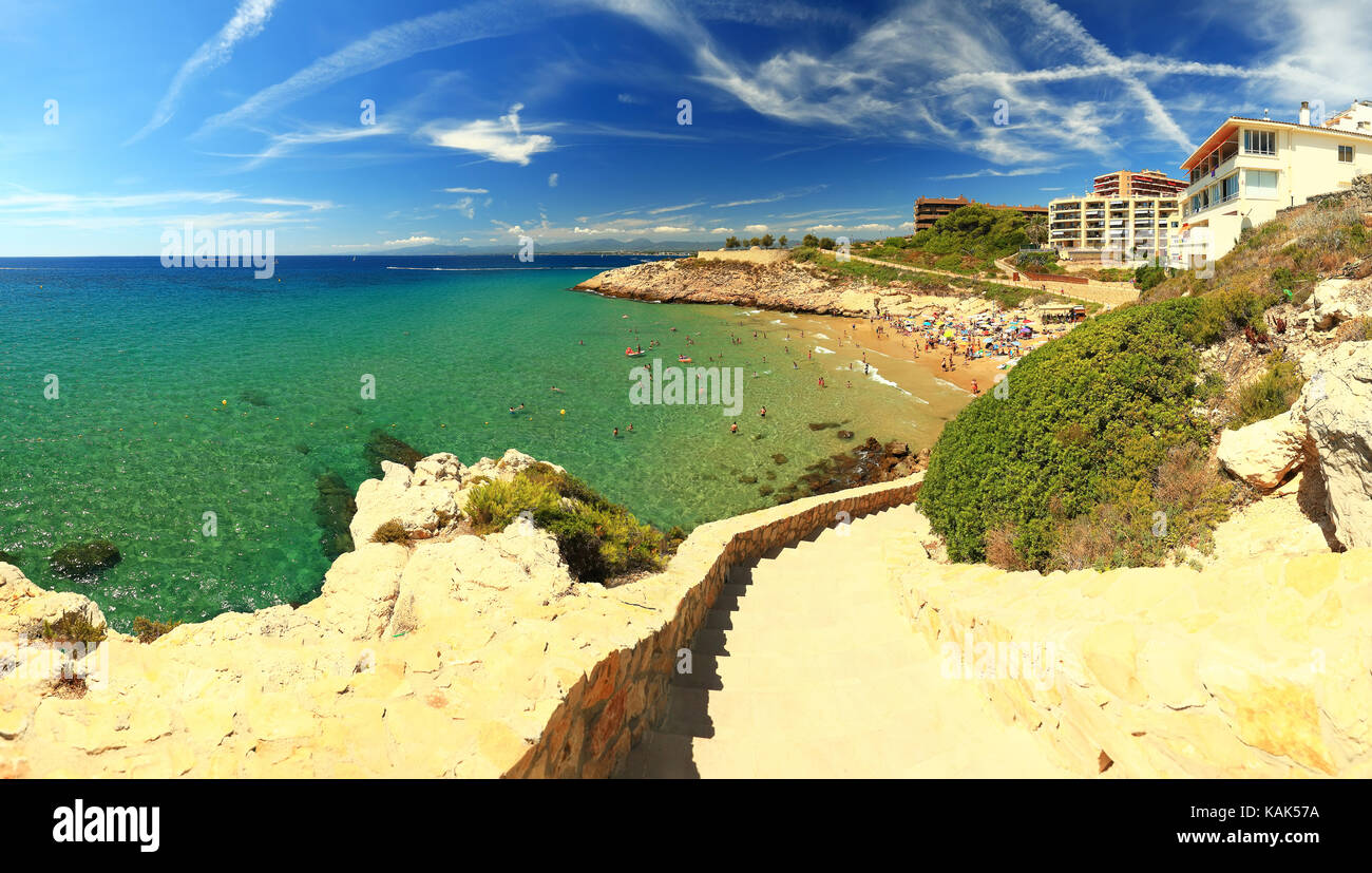 Salou resort town coastline on a sunny summer day. Spanish resort landscape. Typical resort town on the Mediterranean sea coastline. Stock Photo