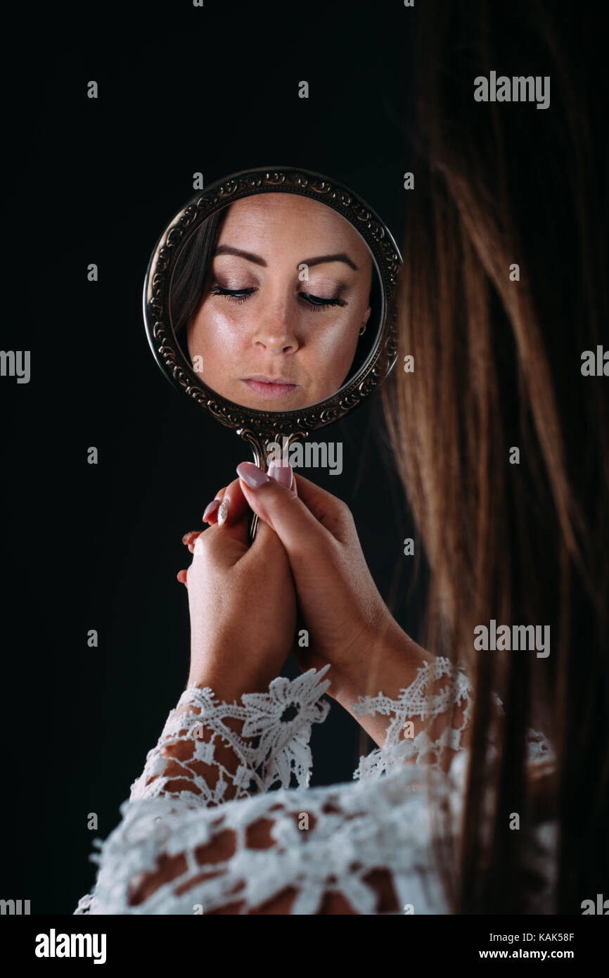 Woman holding hand mirror hires stock photography and images Alamy
