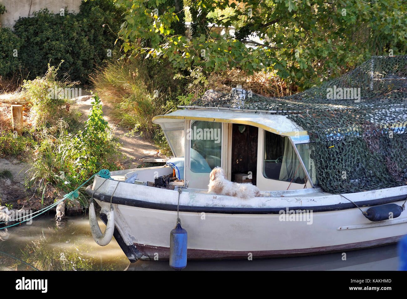 Pleasure boat sailing on the Canal du Midi near Beziers for a tourist cruise Stock Photo