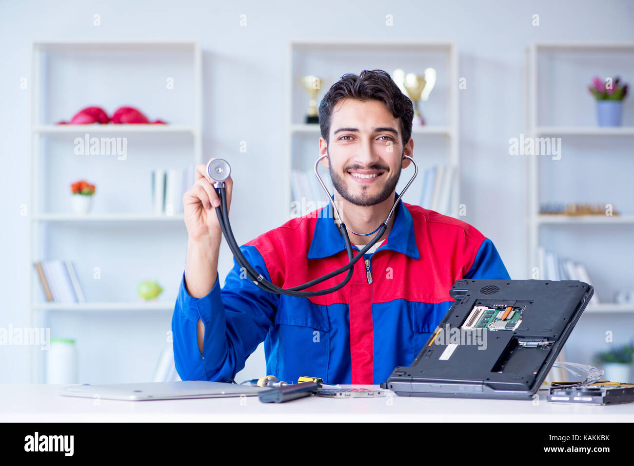 Repairman working in technical support fixing computer laptop